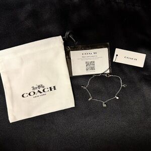 Coach Silver Charm Bracelet with Logo Accents
